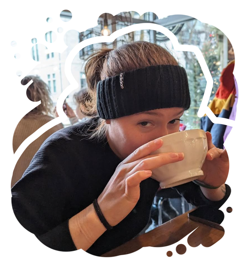 Goofy lady drinking coffee.